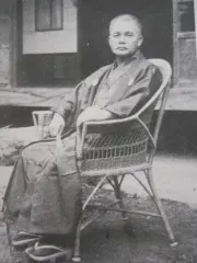 町村金弥
