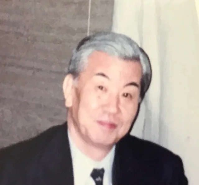 葛和満博